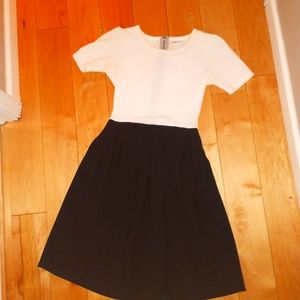 LuLaRoe Amelia Black and White Color Block Dress. Size small